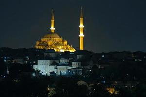 ISTANBUL, TURKEY, 2018  -  Night-time view of the Faith Mosque in Istanbul Turkey on May 98, 2018 photo