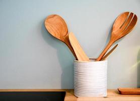 wood ladle and wood folk in the kitchen photo