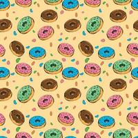 Seamless vector background with colorful donuts