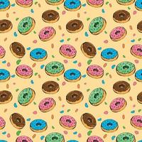 Seamless vector background with colorful donuts