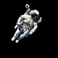 Space suits isolated on black background with clipping path. Elements of this image furnished by NASA. photo