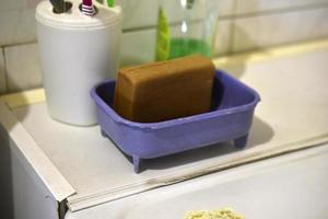 Soap and soap dish in the bathroom photo