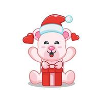 lindo oso polar feliz con regalo de navidad vector