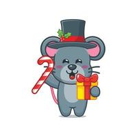 Cute mouse cartoon character holding christmas candy and gift vector