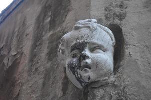Ancient mask in Venice, Italy photo