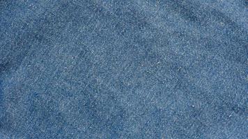 Denim jeans for fashion design, denim jeans fabric texture background with copy space for image or text. photo