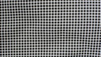 black and white check apparel fabric texture background with copy space for image or text. Gingham Seamless Pattern photo