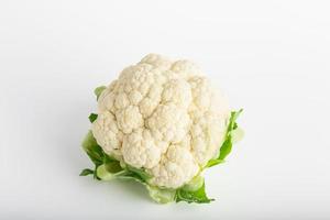 Isolated cauliflower over white, studio shot with single piece, includes copy space. photo