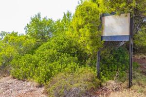 White blank information sign in the nature of Spain. photo