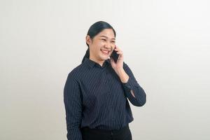 Asian woman using smartphone or mobile phone photo