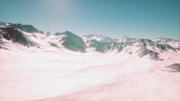 Mountain winter Caucasus landscape with white glaciers and rocky Peak photo