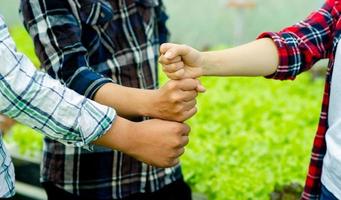 unity, teamwork unity group unity of mind power Put your hands in a vertical line showing determination and energy. team work concept photo