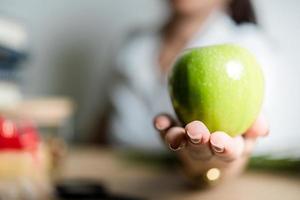 Hands and apples green photo