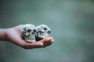 Hand the skull on halloween photo