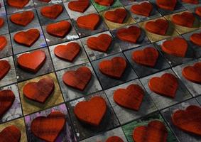 Mosaic of Valentine hearts made from red wood on multi-colored painted splattered and grunge textured blocks pattern. photo