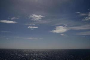 sea with horizon and sky photo
