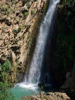 Waterfall below the New Bridge at Ronda Spain photo