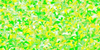 textura de vector verde claro, amarillo con triángulos al azar.