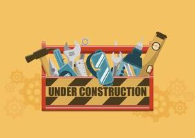 Under construction toolbox with tools vector