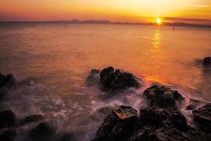 sunset over the sea , long exposure techniques photo