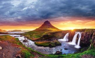 The picturesque sunset over landscapes and waterfalls. Kirkjufel photo