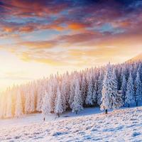 Colorful sunset over the mountain ranges in the national park photo