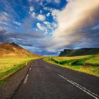 Road in mountains. Bridge over a channel connecting Jokulsarlon photo