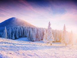 Colorful sunset over the mountain ranges in the national park photo