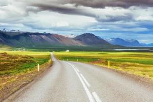 Road in mountains. Bridge over a channel connecting Jokulsarlon photo