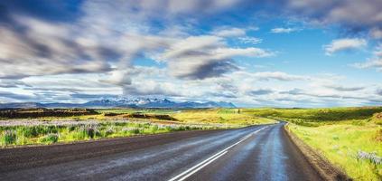 Road in mountains. Bridge over a channel connecting Jokulsarlon photo