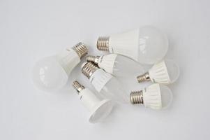 Set of row LED bulbs isolated on white background. photo