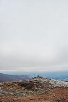 Top of frost mountain hill at Carpathian mountains. Vertical photo