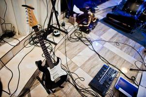 Set of musical instruments. Guitar and drums photo