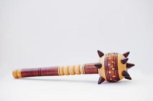 Wooden ukrainian traditional mace isolated on white background. photo