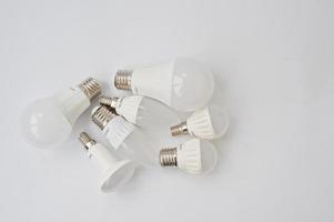 Set of row LED bulbs isolated on white background. photo