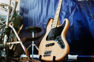 Set of musical instruments. Bass guitar and drums photo