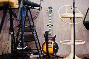 Set of musical instruments. Guitar and drums photo