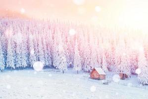 cabin in the mountains in winter, background with some soft high photo