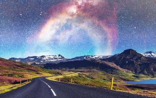 Fantastic starry sky and the milky way. Bridge over a channel c photo