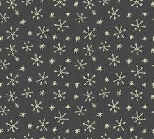 Doodle snowflakes vector pattern. Christmas seamless background with hand drawn snowflakes. Winter design.