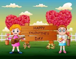 Happy Valentines Day sign with girls standing vector