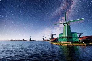 Windmills on the lake photo