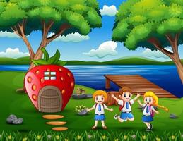 Cheerful school children near the strawberry house vector