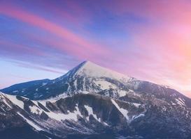 Mysterious winter landscape majestic mountains in photo