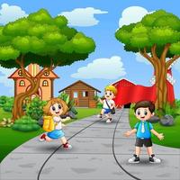 Happy school kids walking on the road vector