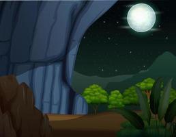 A cave entrance at night illustration vector