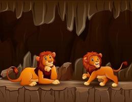 escena con dos leones en la cueva vector