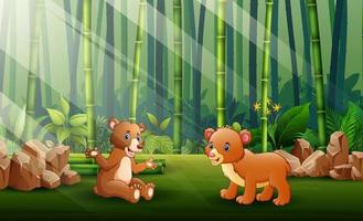 dibujos animados de dos osos en el fondo del bosque de bambú vector