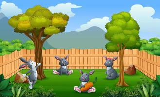 conejos de dibujos animados jugando en la granja