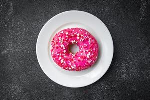 donut pink icing sweet dessert fresh portion healthy meal food photo